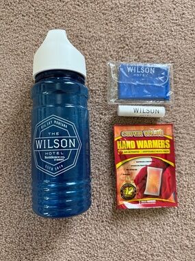 Blue Branded Sports Water Bottle and accessories. The Wilson Big Sky Montana